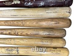 Lot of 15 Vintage Baseball Bats including Jackie Robinson, Berra, Fox, Aaron + Lot of 15 Vintage Baseball Bats including Jackie Robinson, Berra, Fox, Aaron +