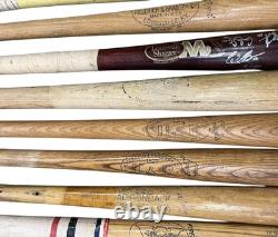 Lot of 15 Vintage Baseball Bats including Jackie Robinson, Berra, Fox, Aaron + Lot of 15 Vintage Baseball Bats including Jackie Robinson, Berra, Fox, Aaron +