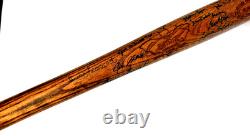 Negro League Hall of Famers and Stars autographed vintage baseball bat. 40 sigs
