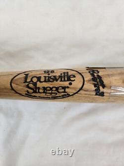 Vintage Game Used Bat Autographed by Kenny Lofton Vintage Game Used Bat Autographed by Kenny Lofton