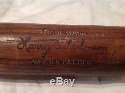 Vintage baseball bat Harry Heilman side written
